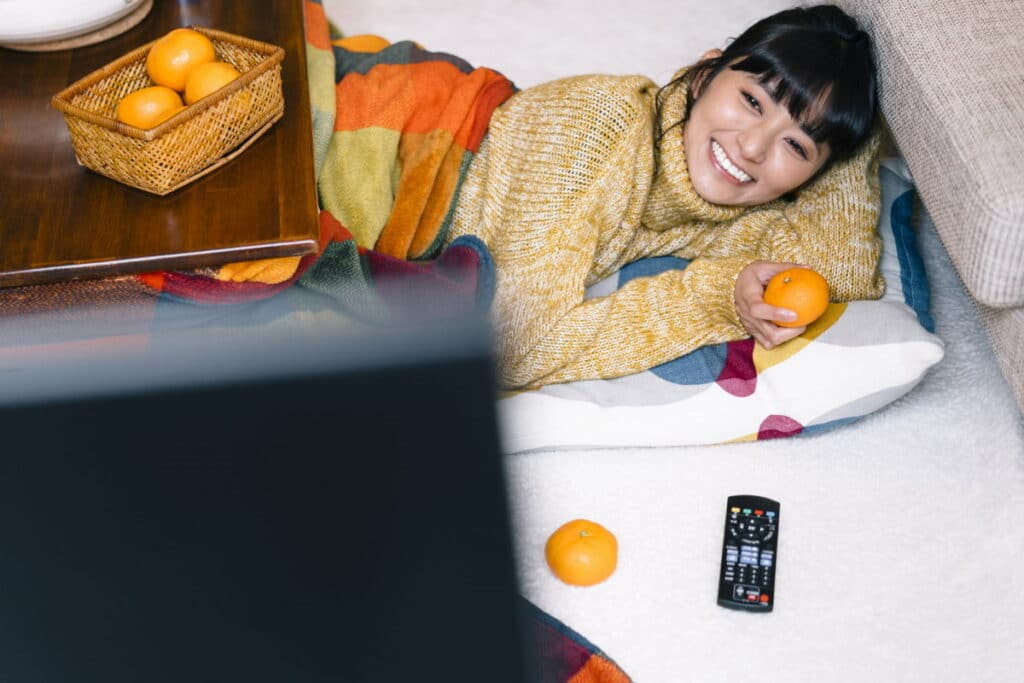 Woman under a kotatsu