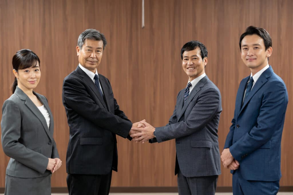 A representative image shows four politicians, only one of them being a woman.