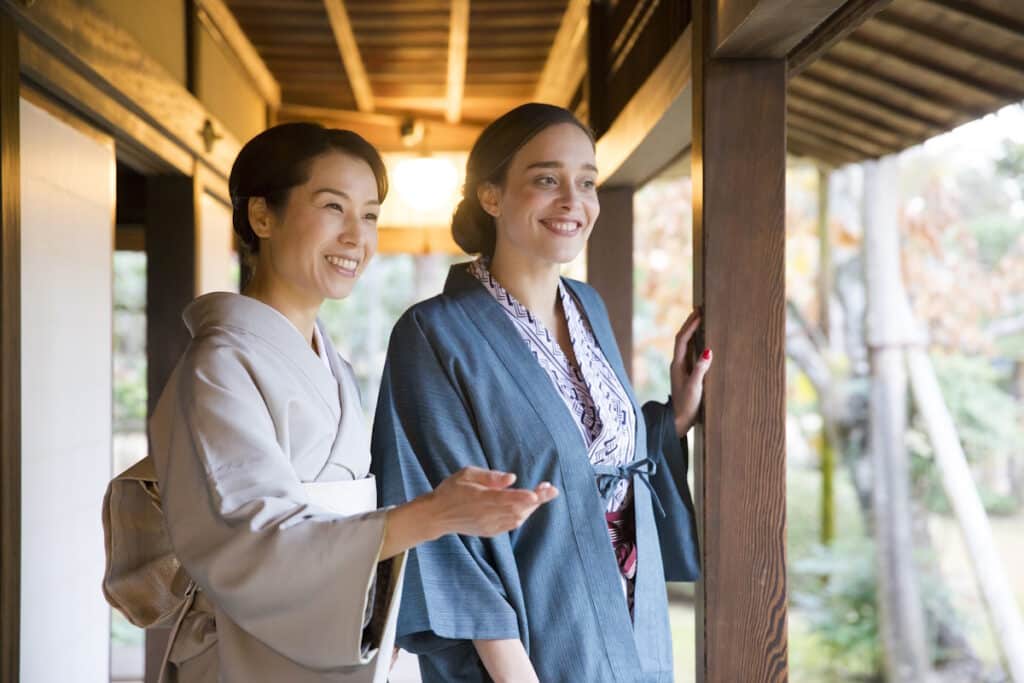 Japanese woman showing a tourist around - Unseen Japan Tours