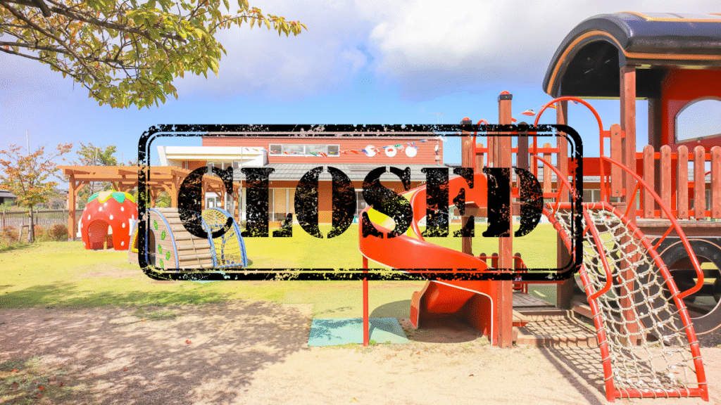 A playground with a Closed sign displayed on top of it