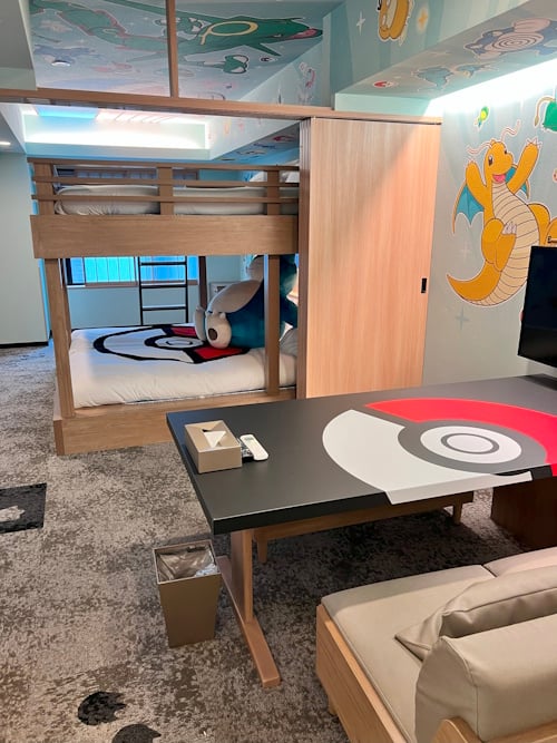 Picture of Pokémon room's bed and dining table/TV