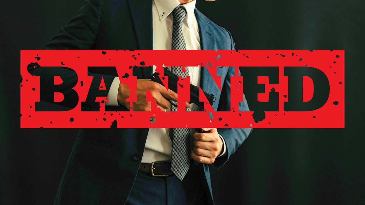 Man in suit pulling out gun from his coat with the word "BANNED" written over him