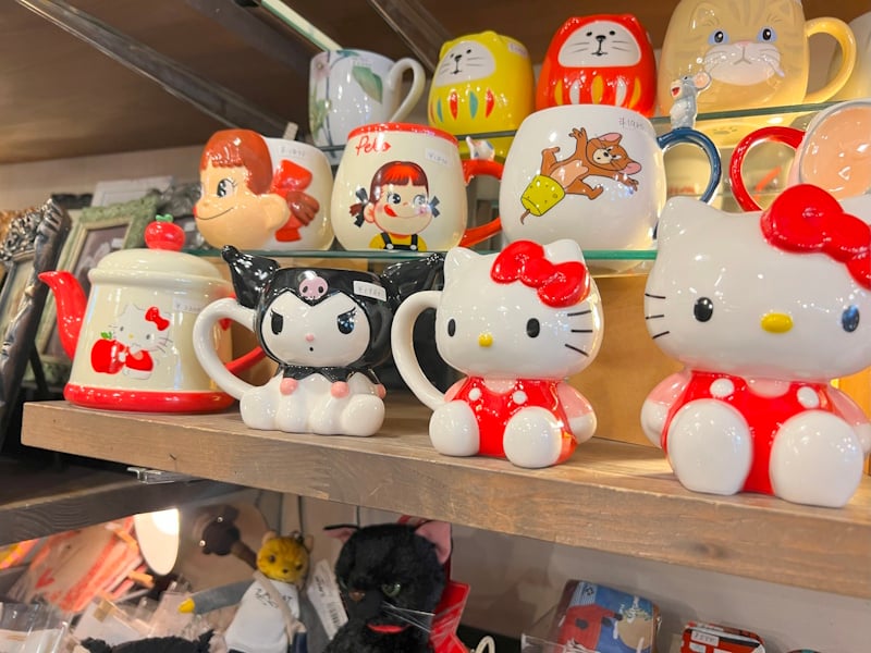 Pop culture memorabilia in Jin, Shimokitazawa. (Pictured: Various mugs showing Kuromi, Hello Kitty, Milky, and Jerry from Tom & Jerry)