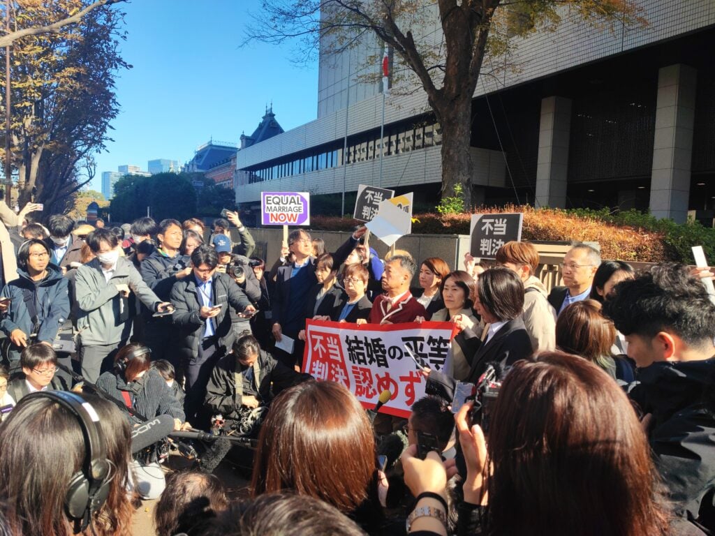 Picture outside of court after marriage equality decision handed down
