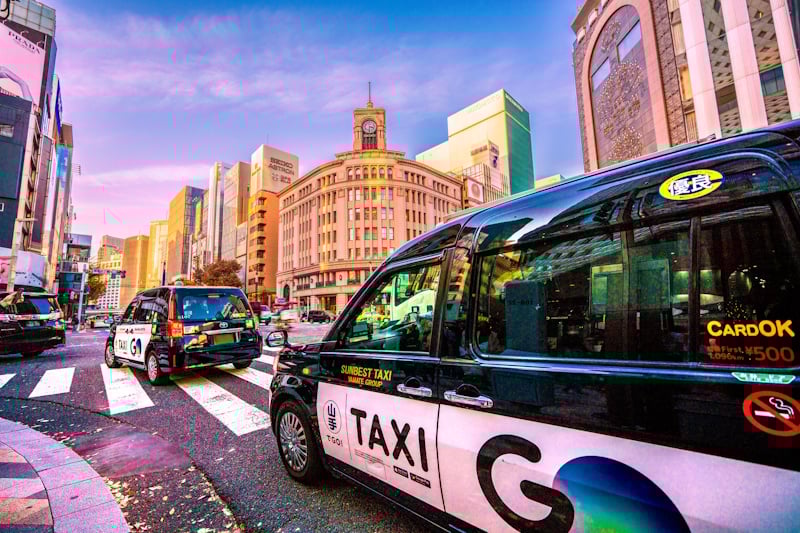Taxis lined up on a street in Tokyo's Ginza district
